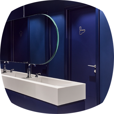 Shower areas equipped with essential amenities like shampoo, lotion, and towels, along with smart toilets for top-notch hygiene.